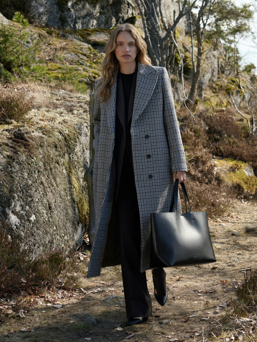 women in long coat